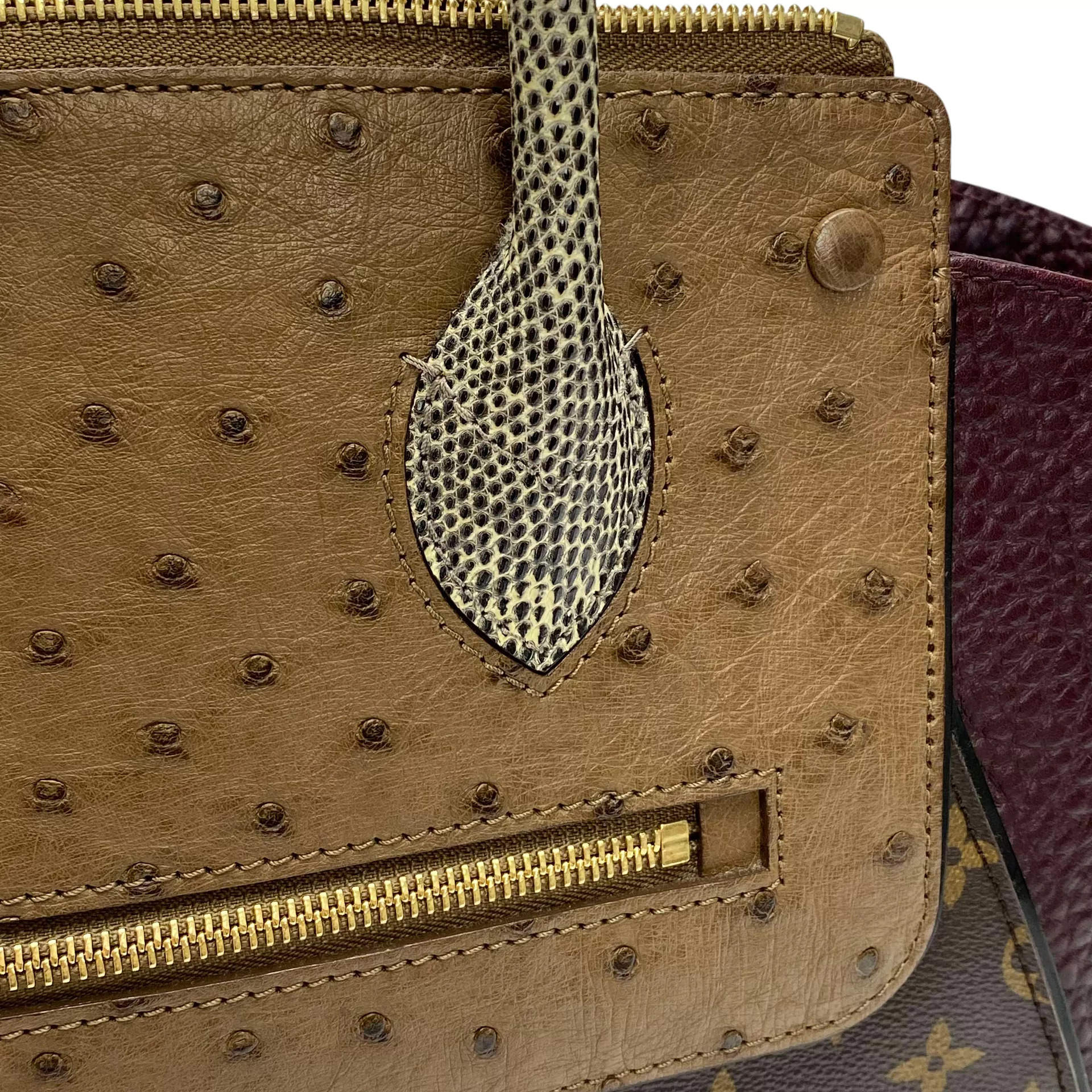 Bolsa Louis Vuitton Majestueux Ostrich Lizard Monogram MM